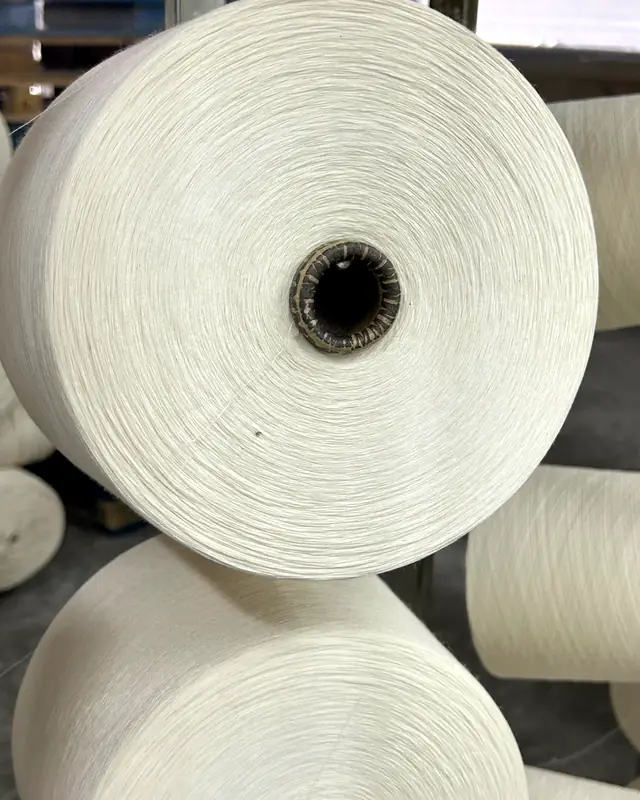 Cones de fio preparados para produção de malhas em Portugal